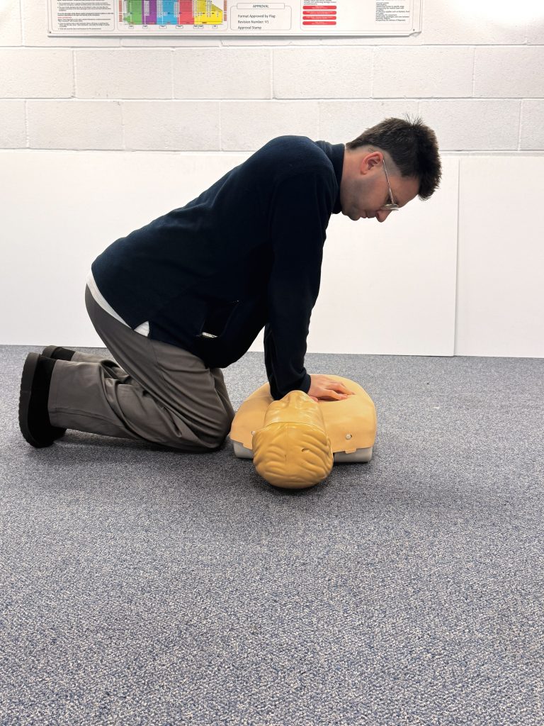 Image of someone performing chest compressions on a manikin as part of a Primary Survey