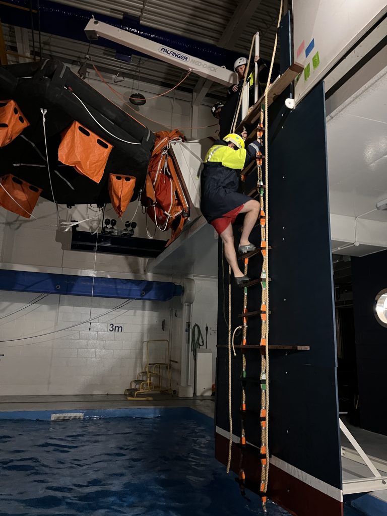 Image of crew descending a Pilot Ladder in a Pilot Ladder Safety Training session