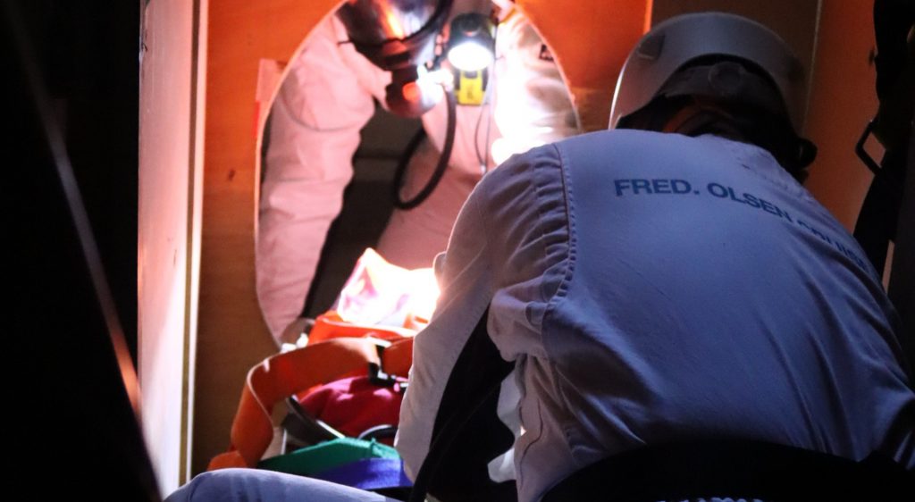 Delegates extracting a casualty during confined space training